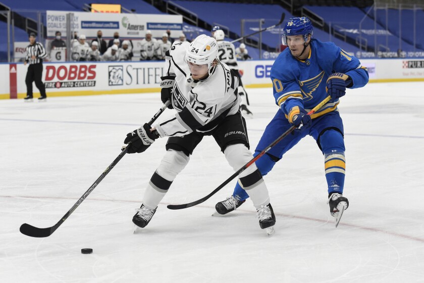 The St. Louis Blues' Oskar Sundqvist, right, pressures the Kings' Lias Andersson during the first period Jan. 23, 2021.