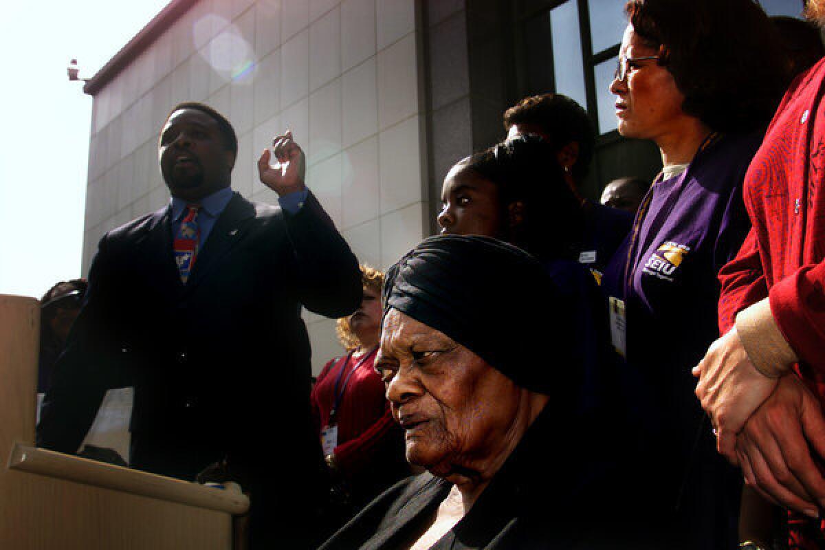 Until his fall from grace, Tyrone Freeman, shown above left in a 2002 file photo, represented about 190,000 home-care workers in the SEIU chapter and an affiliated local, whose members made as little as $9 an hour. “May God have mercy on me,” said Freeman before he was sentenced. “I am accountable for these bad decisions.”
