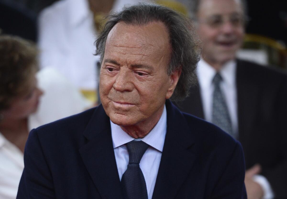 Julio Iglesias denies sexual assault allegations: 'Absolutely untrue' - Los Angeles Times