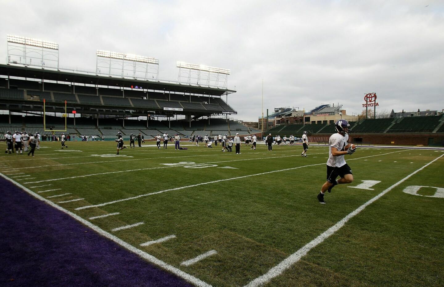A general view as the Northwestern practices for a game against Illinois at Wrigley Field.