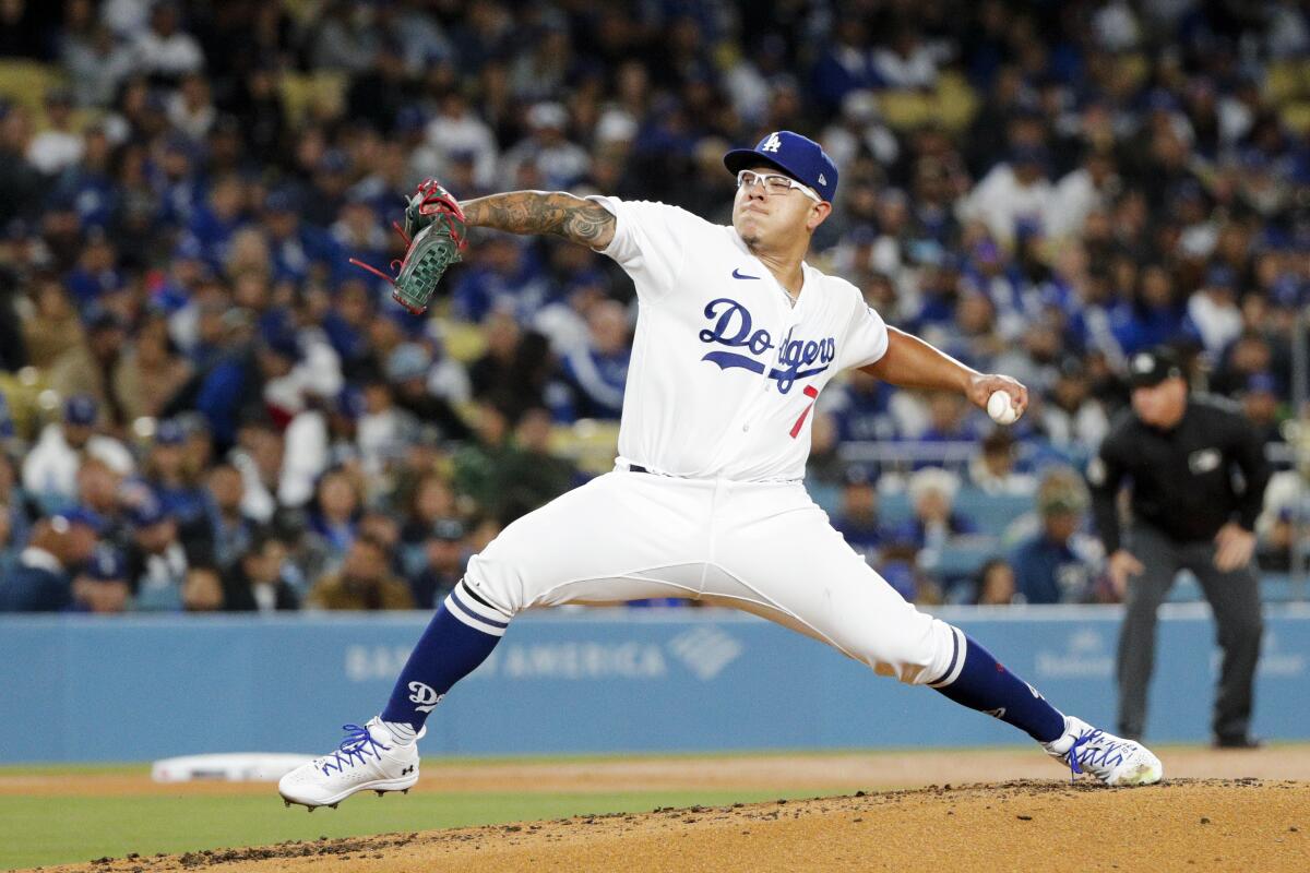 Dodgers starting pitcher Julio Urías delivers during an 8-2 season-opening win over the Arizona Diamondbacks.