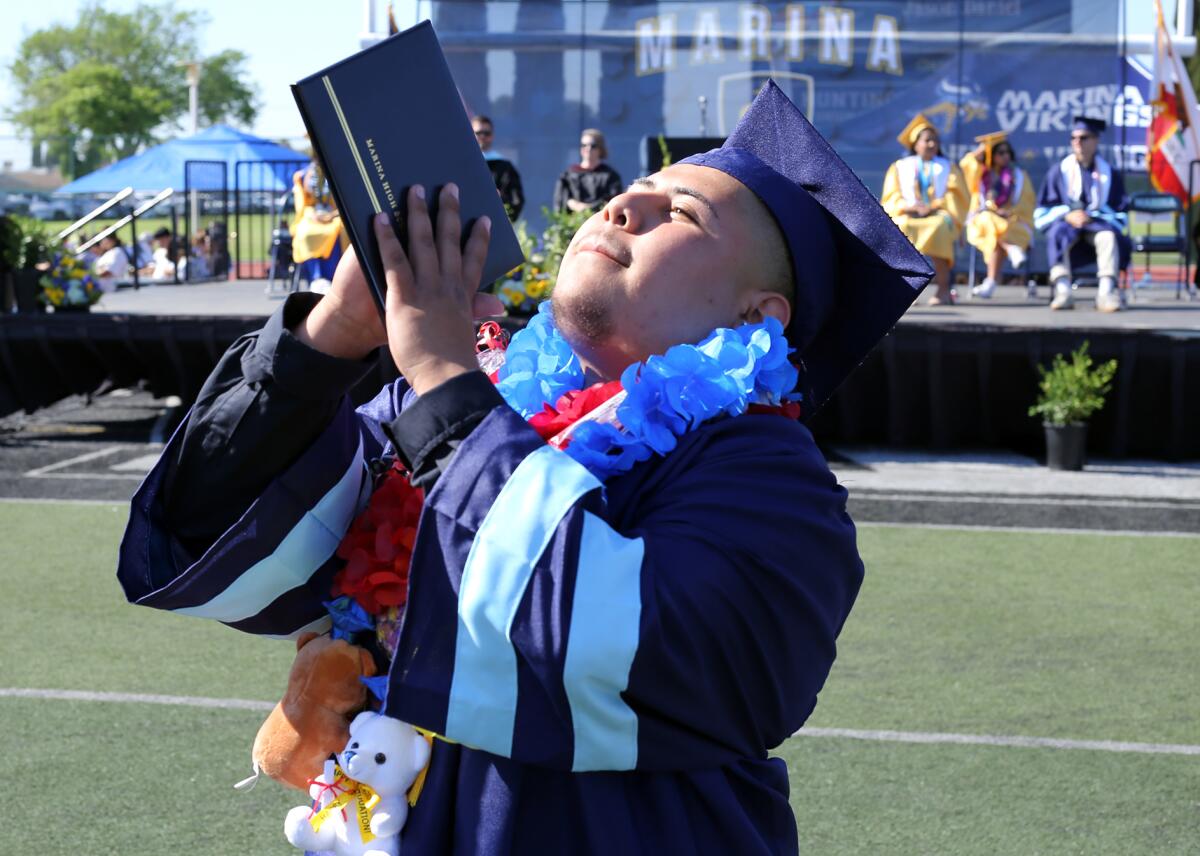 Marina High School graduate Fardy Javier Chavez is grateful after receiving his diploma during Thursday's ceremony.