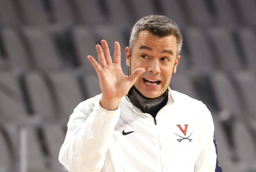 Virginia head coach Tony Bennett calls a play as Virginia plays Gonzaga during the second half of an NCAA college basketball game, Saturday, Dec. 26, 2020, in Fort Worth, Texas. (AP Photo/Ron Jenkins)