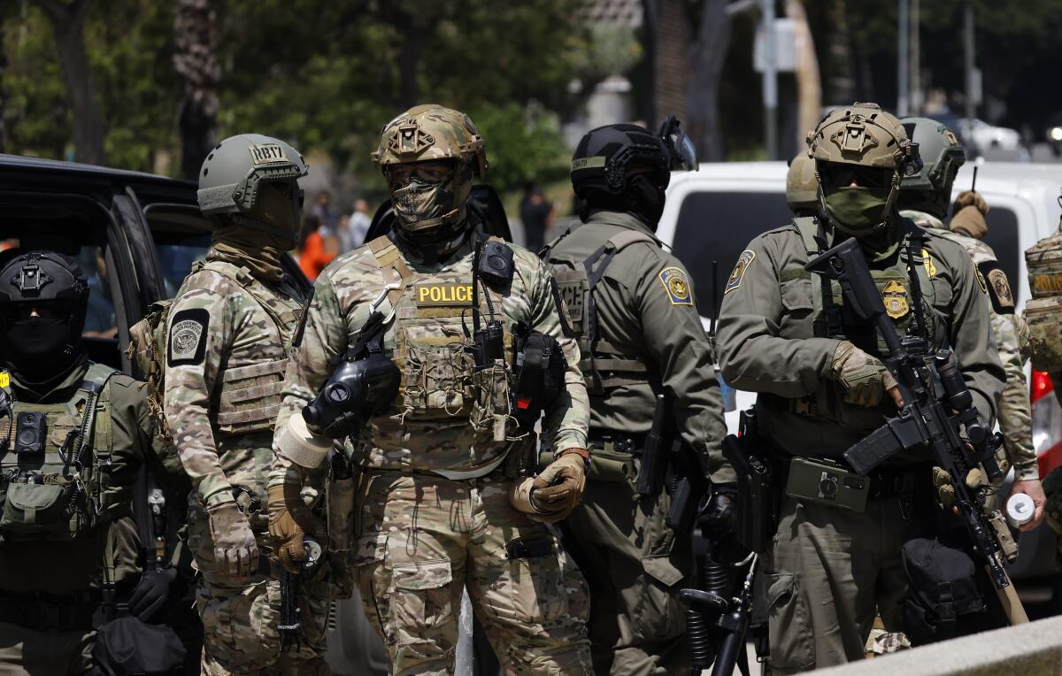 Heavily armed immigration agents descend on L.A.'s MacArthur Park - Los Angeles Times