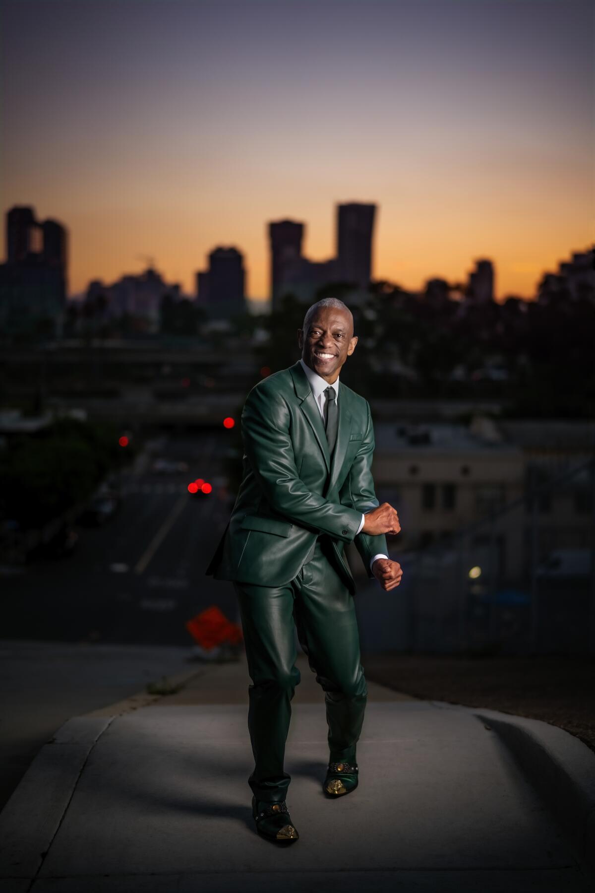 San Diego soul singer Earl Thomas photographed in front of the San Diego skyline at sunset.