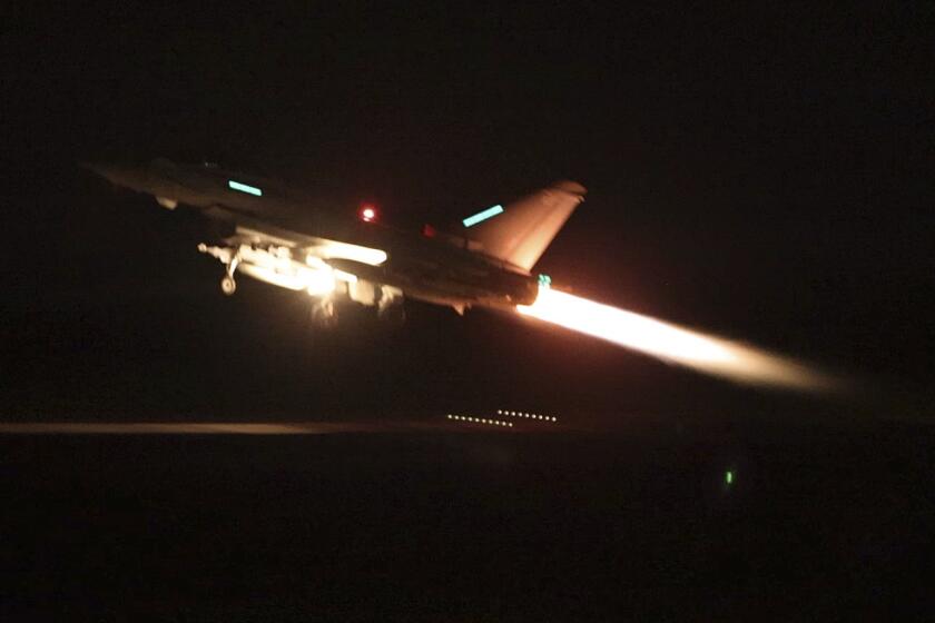 In this image provided by the UK Ministry of Defence taken on Thursday Jan. 11, 2024 shows an RAF Typhoon aircraft taking off from RAF Akrotiri in Cyprus, for a mission to strike targets in Yemen. The U.S. and British militaries bombed more than a dozen sites used by the Iranian-backed Houthis in Yemen late on Thursday, in a massive retaliatory strike using warship- and submarine-launched Tomahawk missiles and fighter jets, U.S. officials said. (Sgt Lee Goddard, UK Ministry of Defence via AP)