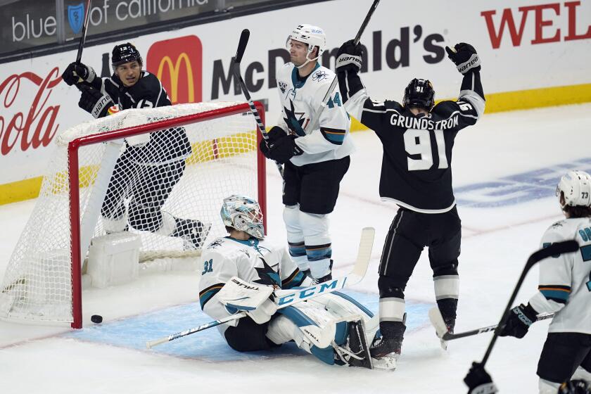 Los Angeles Kings left wing Carl Grundstrom (91) celebrates after scoring a goal.