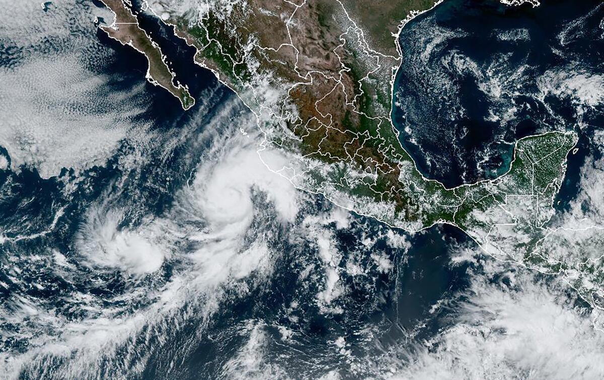 This satellite image taken at 20:20 UTC and provided by NOAA shows Tropical Storm Orlene on Saturday, Oct. 1, 2022. Orlene grew to hurricane strength Saturday and is heading for an expected landfall early next week on Mexico's northwestern Pacific coast. (NOAA via AP)