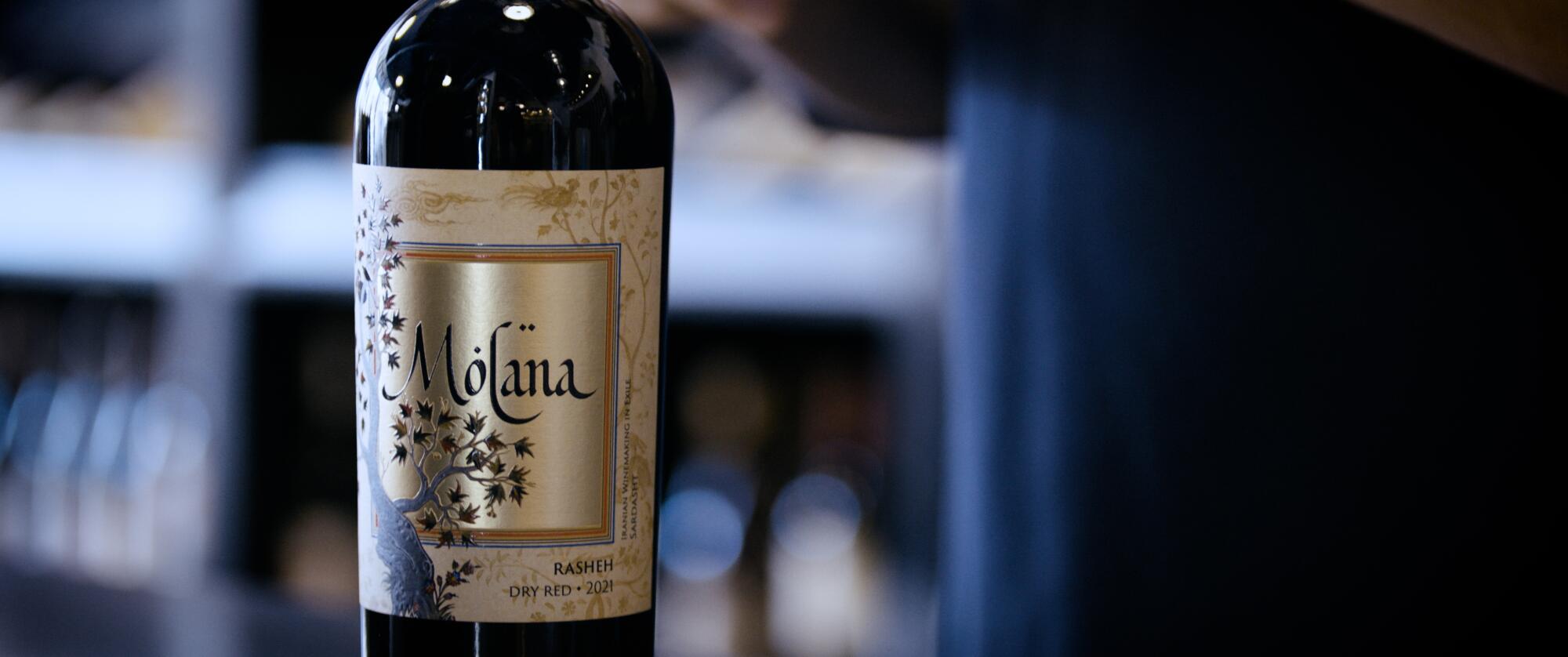 A closeup of the label on a bottle of Mòlna wine made from Rasheh grapes