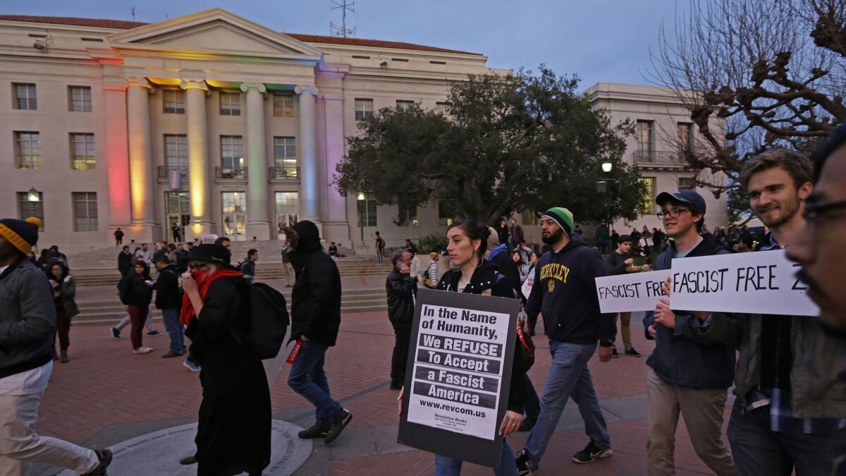 People march in front of Sproul Plaza on the UC Berkeley campus to protest the appearance of far-right activist Milo Yiannopoulos in 2017.