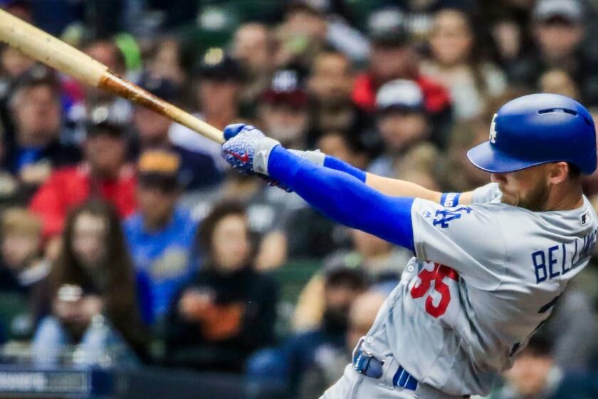 Mandatory Credit: Photo by TANNEN MAURY/EPA-EFE/REX (10214133t) Los Angeles Dodgers right fielder Cody Bellinger hits a home run in the sixth inning of the MLB game between the Los Angeles Dodgers and the Milwaukee Brewers at Miller Park in Milwaukee, Wisconsin, USA, 18 April 2019. Los Angeles Dodgers at Milwaukee Brewers, USA - 18 Apr 2019 ** Usable by LA, CT and MoD ONLY **