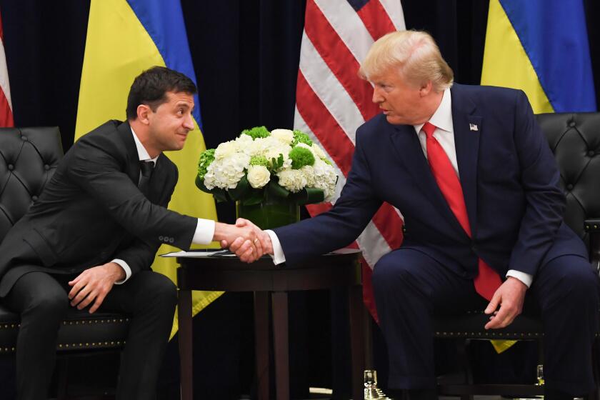 US President Donald Trump and Ukrainian President Volodymyr Zelensky shake hands during a meeting in New York on September 25, 2019, on the sidelines fo the United Nations General Assembly. (Photo by SAUL LOEB / AFP)SAUL LOEB/AFP/Getty Images ** OUTS - ELSENT, FPG, CM - OUTS * NM, PH, VA if sourced by CT, LA or MoD **