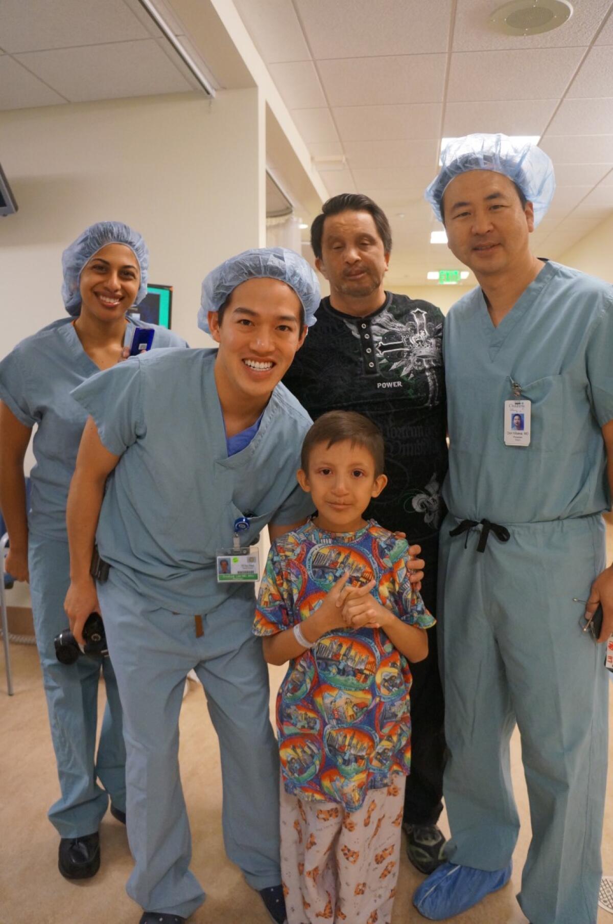 Fresh Start volunteers with a patient.