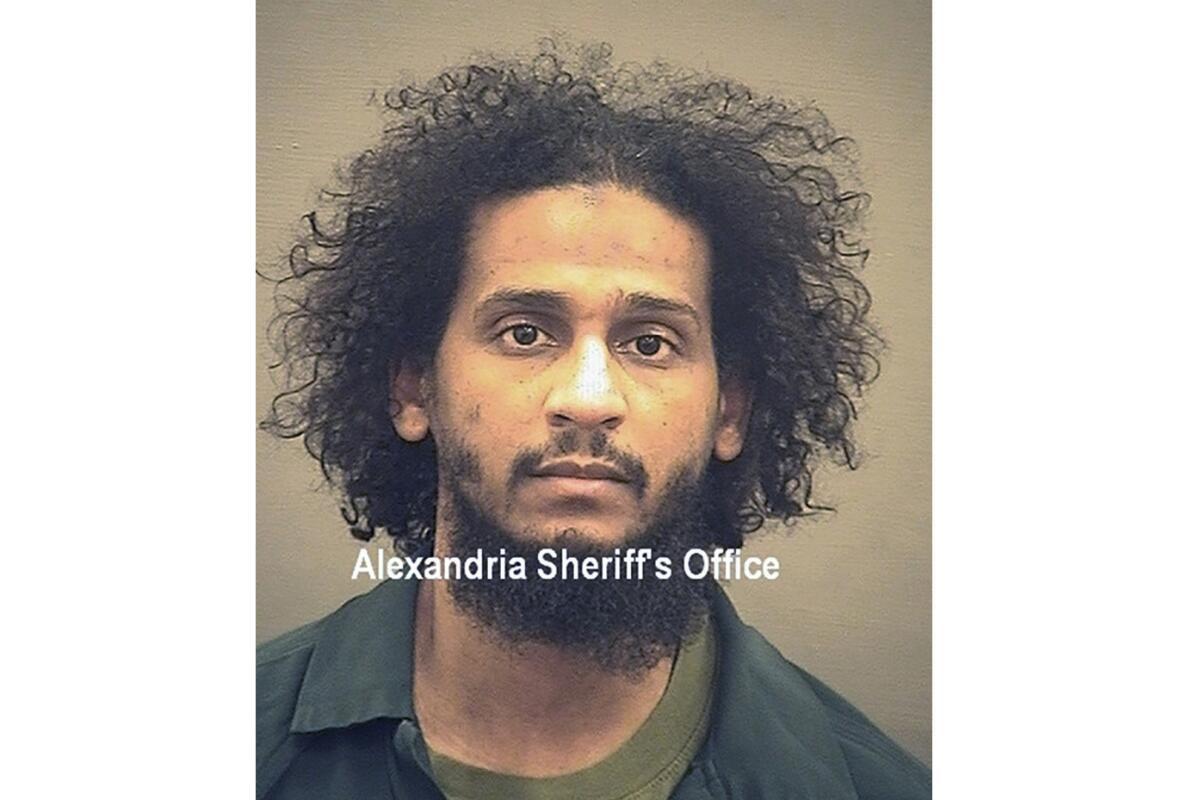 FILE - In this photo provided by the Alexandria Sheriff's Office is El Shafee Elsheikh who is in custody at the Alexandria Adult Detention Center, Wednesday, Oct. 7, 2020, in Alexandria, Va. The British national was sentenced to life in prison on Friday, Aug. 19, 2022 for his role in an Islamic State hostage-taking scheme. Roughly two dozen Westerners were taken captive a decade ago by a notorious group of masked captors nicknamed “The Beatles” for their British accents. El Shafee Elsheikh received his sentence Friday in an Alexandria, Va. courtroom. (Alexandria Sheriff's Office via AP)