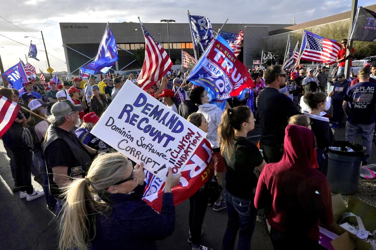 Supporters of President Trump rally outside the Maricopa County Recorder's Office in Phoenix on Nov. 7. 