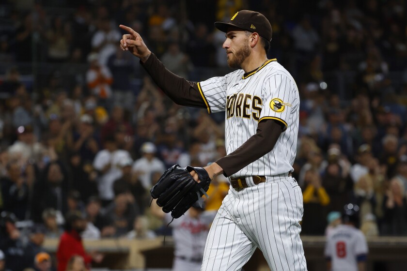 Ad arrives for baseball uniforms in America, beginning with the Padres SAN DIEGO, CA - APRIL 14, 2022: Joe Musgrove of the San Diego Padres salutes fans as he leaves the game in the seventh inning against the Atlanta Braves on Opening Day on Thursday, April 14, 2022 at Petco Park. (Casey Alfred / The San Diego Union-Tribune)