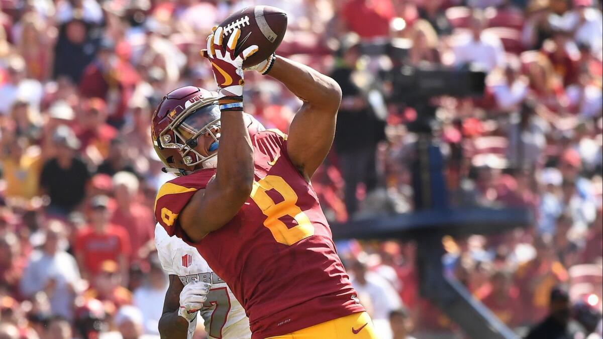 USC receiver Amon-Ra St. Brown catches a touchdown pass against UNLV.