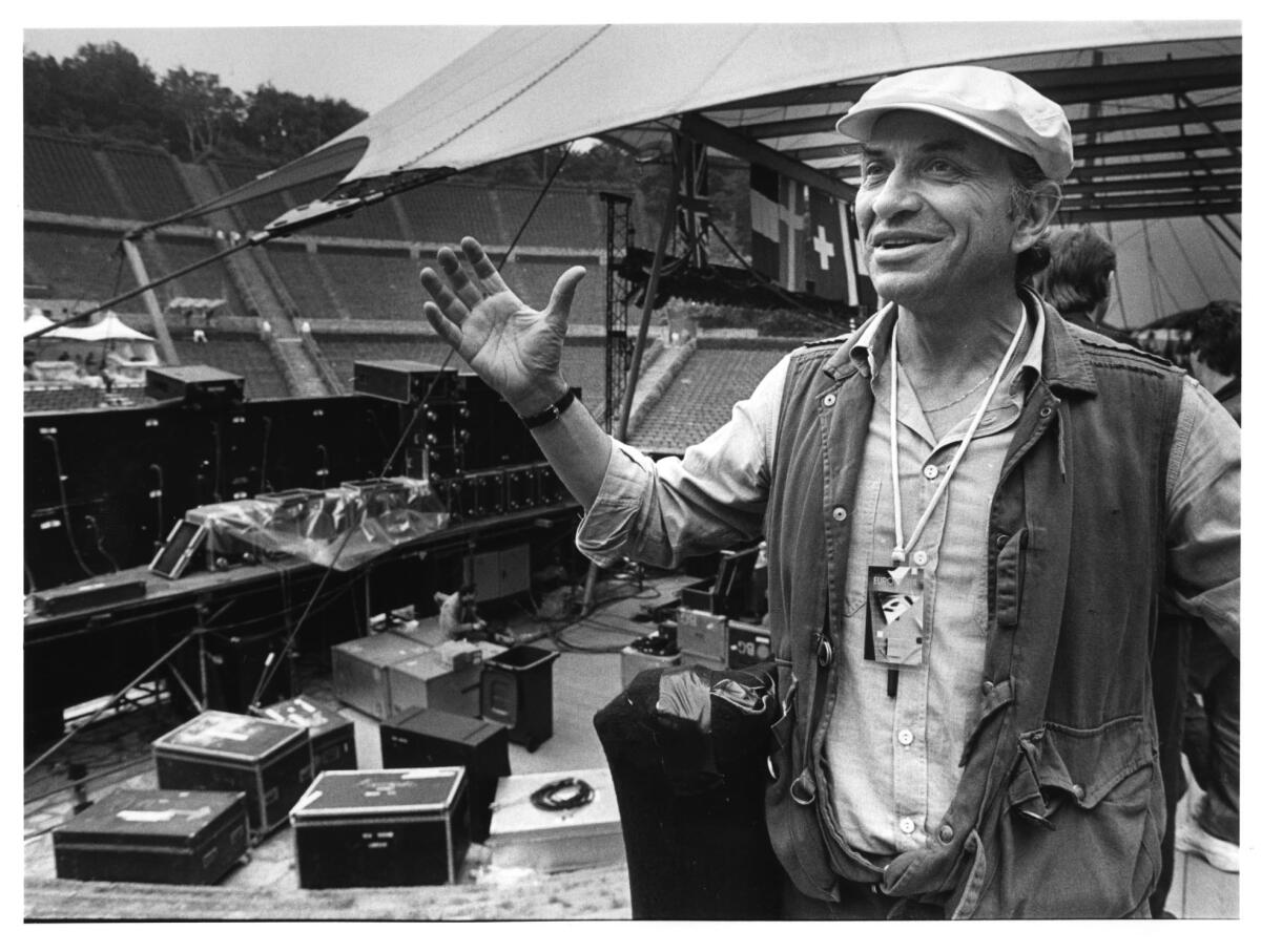 The late concert promoter Bill Graham, photographed backstage in 1984 in Berlin before a Bob Dylan concert, will be the subject of a new exhibition on his life and career opening May 7 at the Skirball Cultural Center in Los Angeles.