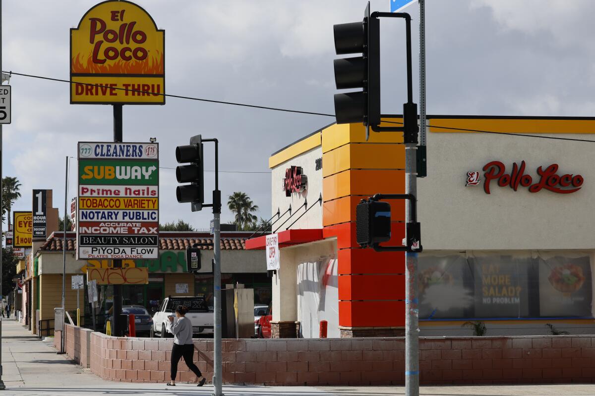 Fast-food restaurants on Crenshaw Boulevard including an El Pollo Loco.