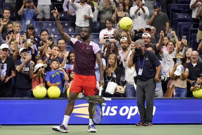 Frances Tiafoe acknowledges the crowd after losing to Carlos Alcaraz during a U.S. Open semifinal Sept. 9, 2022.