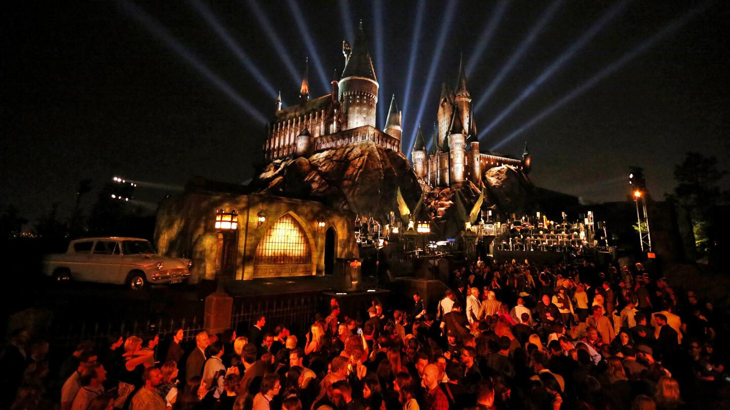 Lights shine behind Hogwarts castle on April 5, 2016, as Universal Studios Hollywood debuts the Wizarding World of Harry Potter for celebrities, VIPs and members of the media.