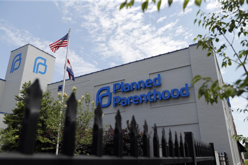 FILE - In this Tuesday, June 4, 2019 file photo, a Planned Parenthood clinic is seen in St. Louis. Missouri's only abortion clinic will be able to keep operating after a state government administrator decided Friday, May 29, 2020, that the health department was wrong not to renew the license of Planned Parenthood's St. Louis facility. (AP Photo/Jeff Roberson, File)