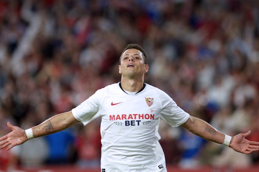 Sevilla's Mexican forward Chicharito celebrates after scoring a goal during the Spanish league football match between Sevilla FC and Getafe CF at the Ramon Sanchez Pizjuan stadium in Seville on October 27, 2019. (Photo by CRISTINA QUICLER / AFP) (Photo by CRISTINA QUICLER/AFP via Getty Images)