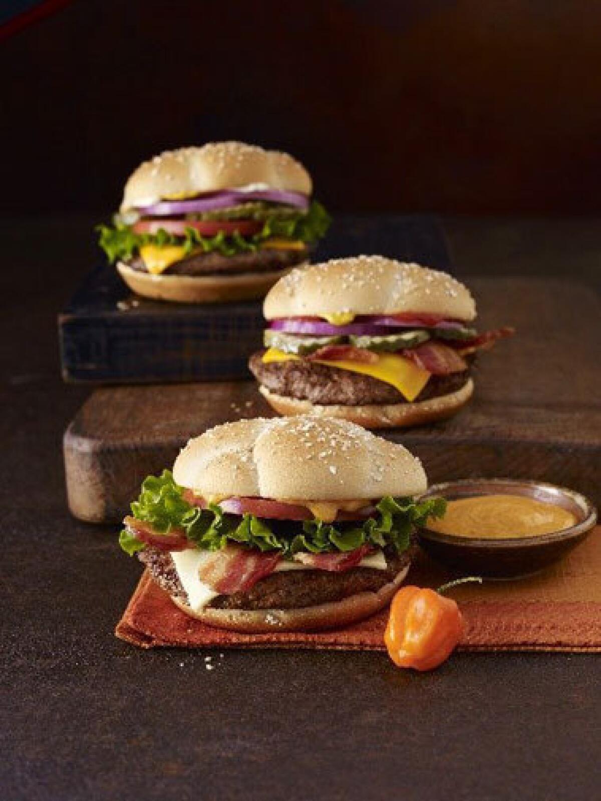 McDonald's is adding three new Quarter Pounders to its menu.