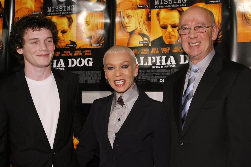 Actor Anton Yelchin poses with his mother Irina and father Victor at the premiere of the Universal Pictures' film "Alpha Dog" on January 3, 2007 at the Arclight Theatres in Hollywood, California. Anton Yelchin died early Sunday morning.