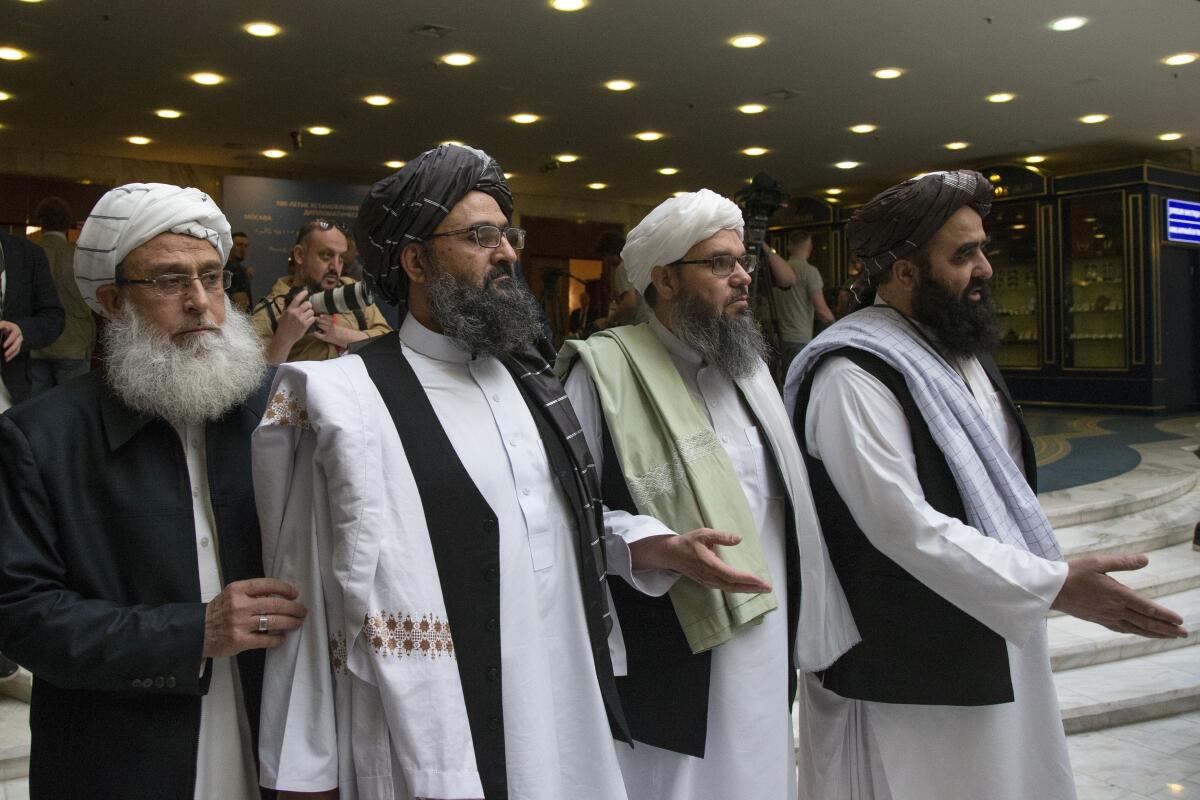 A Taliban delegation arrives for talks with Afghan politicians in Moscow in 2019. 
