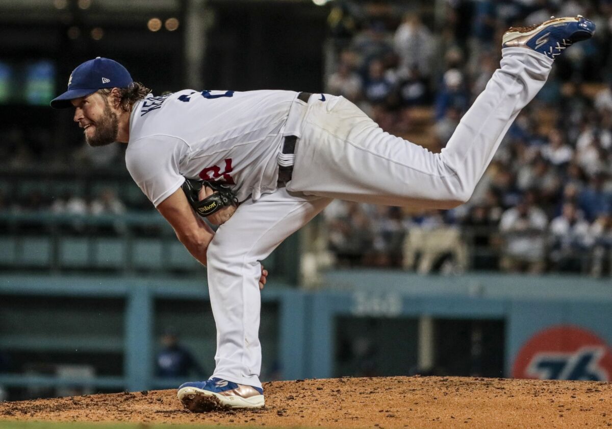Dodgers pitcher Clayton Kershaw delivers during a 5-1 win over the Arizona Diamondbacks on Monday.