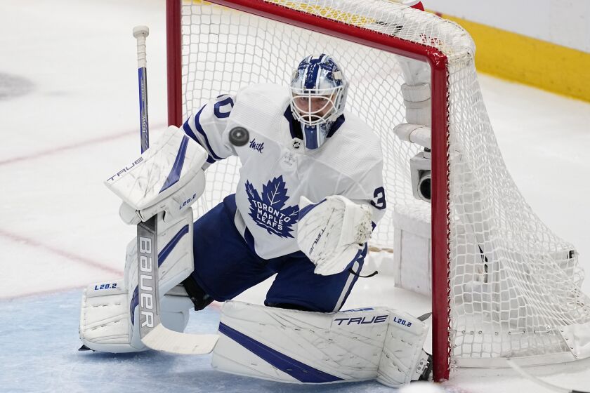 Toronto Maple Leafs goaltender Matt Murray reaches out to glove a shot in the second period of an NHL hockey game against the Dallas Stars, Tuesday, Dec. 6, 2022, in Dallas. (AP Photo/Tony Gutierrez)