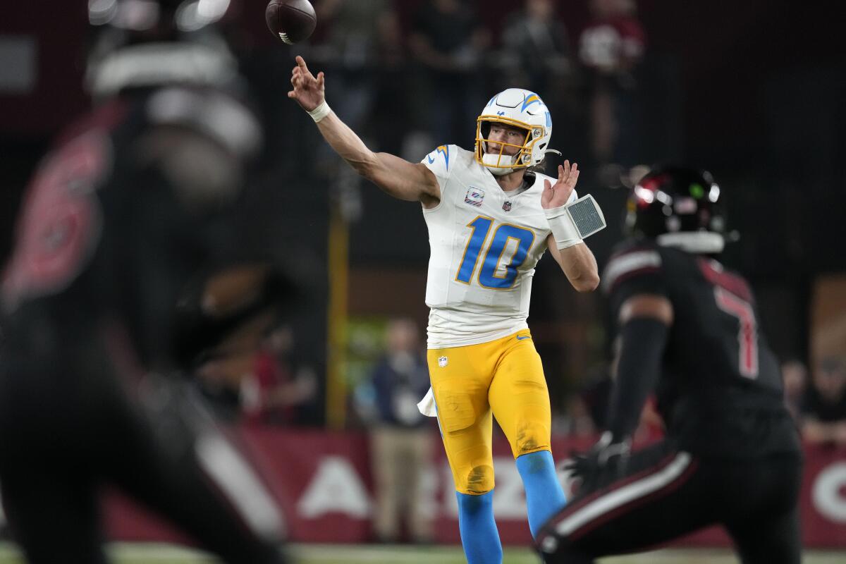 Chargers quarterback Justin Herbert throws a pass during the second half against the Cardinals.