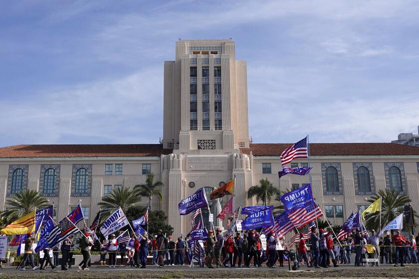 SAN DIEGO, CA - JANUARY 06: Donald Trump supporters gather for a rally in front the County Administration Building on Wednesday, Jan. 6, 2021 in San Diego, CA. (K.C. Alfred / The San Diego Union-Tribune)
