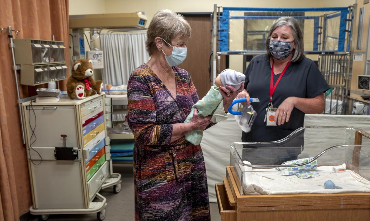 Penny Weismuller with registered nurse Joelle Otteson in the Nursing Skills Lab at CSUF.