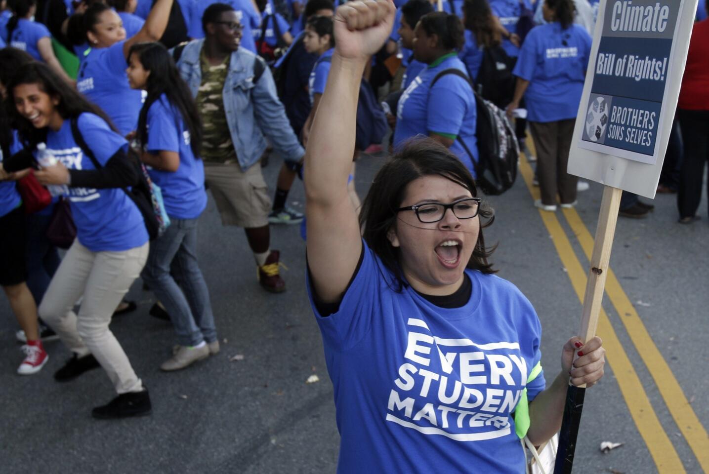 Parent Lydia Avala is elated over the passing of the "School Climate Bill of Rights" as members of teachers union UTLA, parents and others rally outside the Los Angeles Unified School Board meeting.