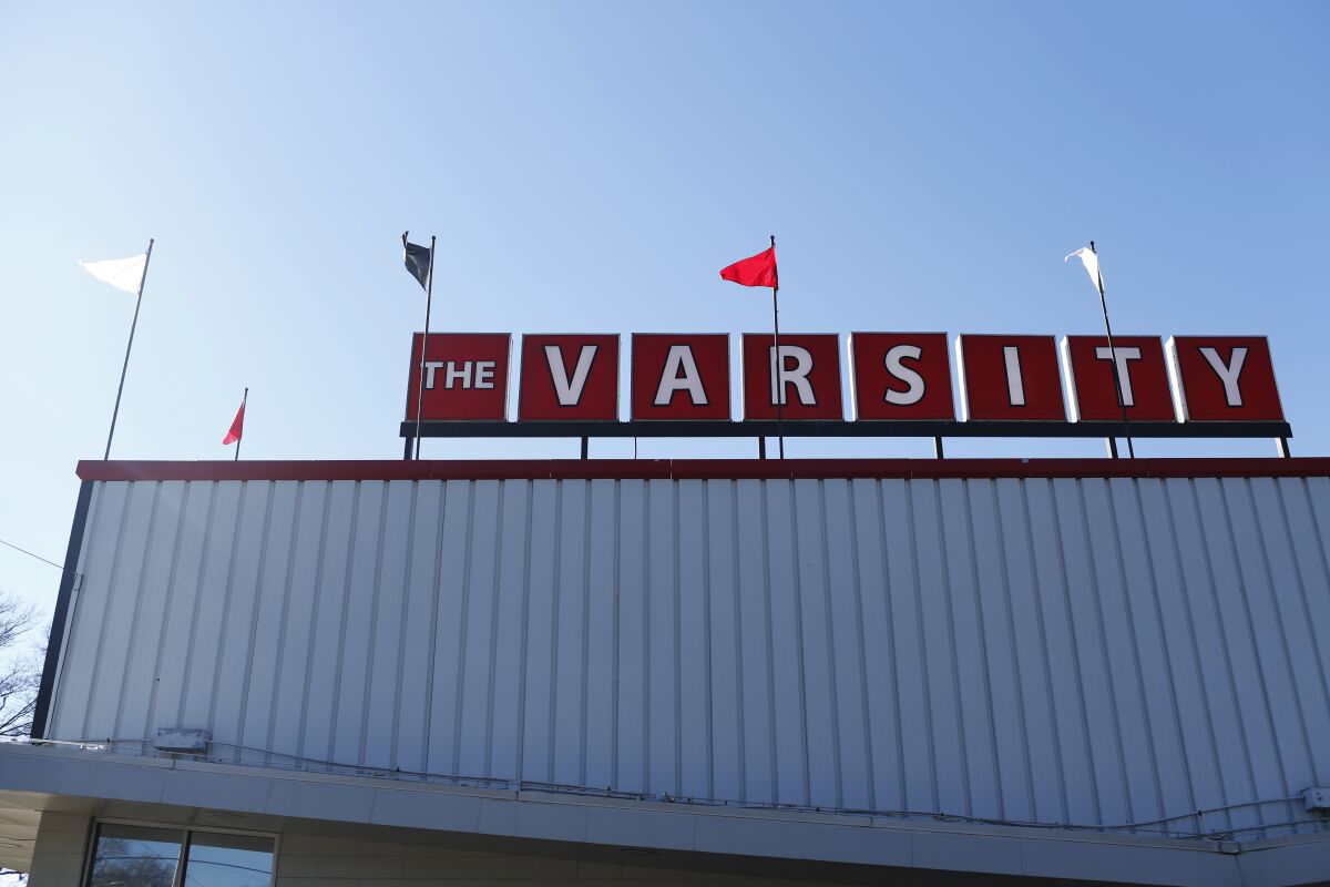 The Varsity restaurant in Athens, Ga., is shown on Wednesday, Jan. 16, 2019. The Athens Banner-Herald reports The Varsity has applied for permission to tear down its decades-old Athens location. The Varsity has operated in Athens since 1932. The Varsity’s current location was targeted repeatedly by desegregation demonstrations in 1963 and 1964, with the Ku Klux Klan at times holding counter-protests. No plans have been filed yet for what will replace the restaurant. (Joshua L. Jones/Athens Banner-Herald via AP)