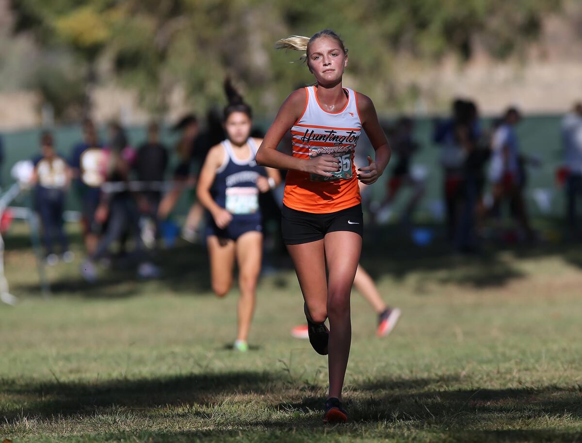 Brooke Adams is near the front in the Division 2 girls' varsity race for Huntington Beach during the Orange County Cross-Country Championships at Oak Canyon Park on Saturday.