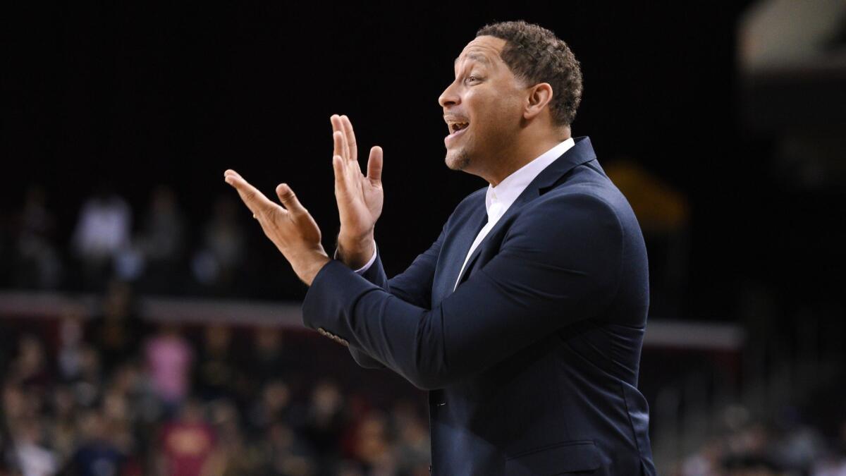 Tony Bland yells out instructions during a game between the USC men's basketball team and Stanford in January 2017. Bland pleaded guilty to a felony bribery charge in January.