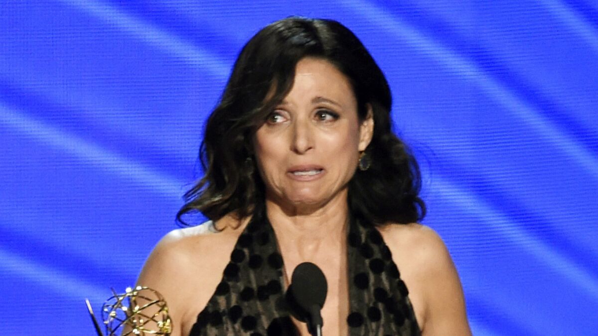 An emotional Julia Louis-Dreyfus pays tribute to her late father after winning lead actress in a comedy.