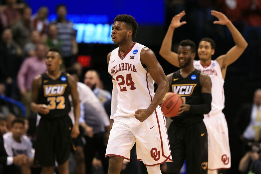 Oklahoma guard Buddy Hield (24) reacts in the second half of a second round NCAA tournament game against Virginia Commonwealth.