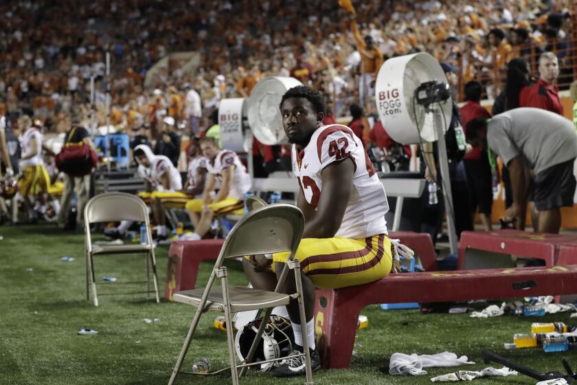USC linebacker Abdul-Malik McClain (42) sits on the bench during the final seconds of the second half of an NCAA college football game in a 37-14 loss to Texas, Saturday, Sept. 15, 2018, in Austin, Texas. (AP Photo/Eric Gay)