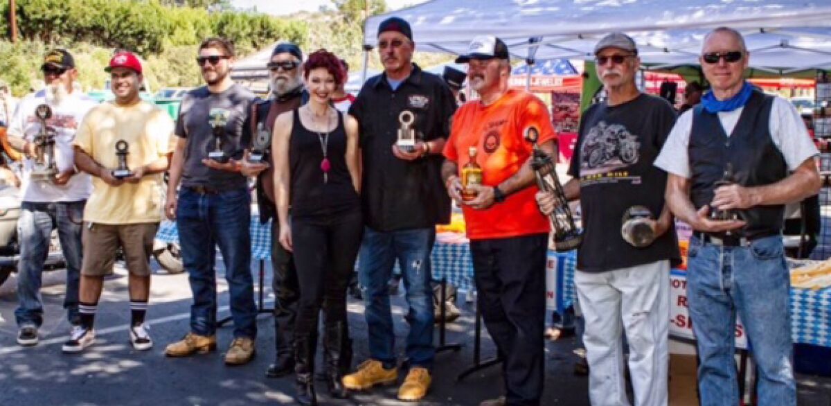 Awards are presented to motorcyclists for their outstanding bikes in the Custom Motorcycle Show.