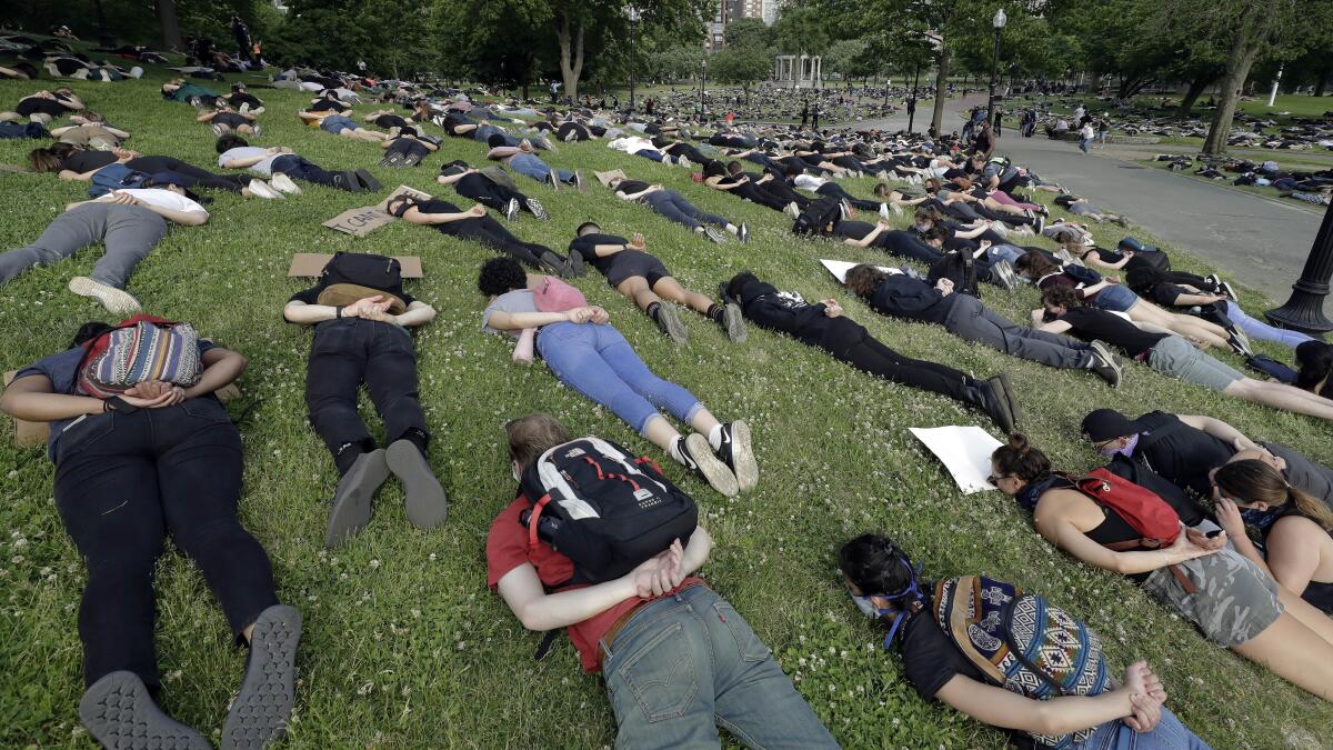 Demonstrators lie face down during protest in Boston on Wednesday.