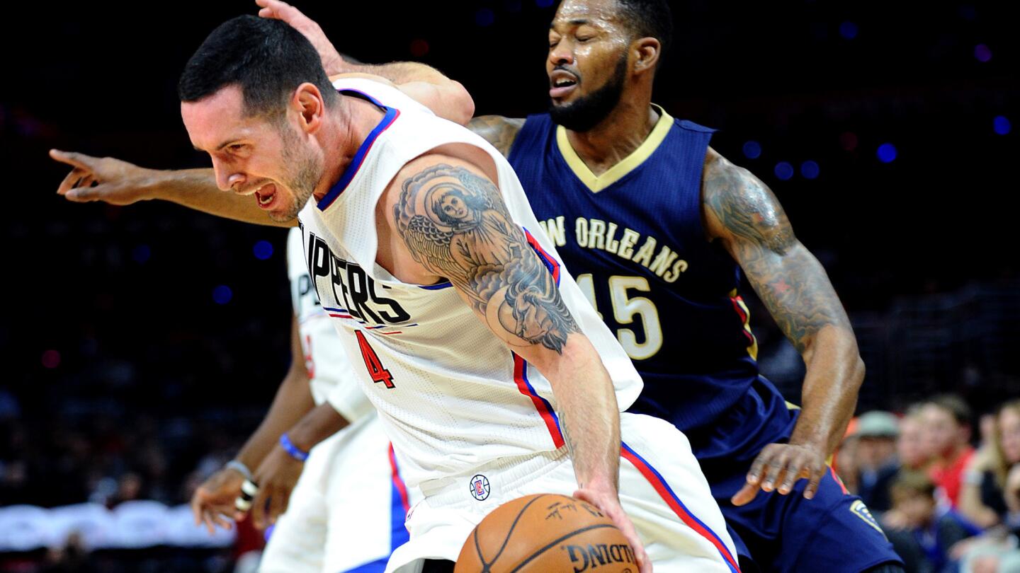 Clippers guard J.J. Redick beats Pelicans forward Alonzo Gee on a drive during their game Friday night.
