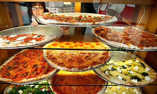 The pizzas on display at Vito's Pizzeria on La Cienega Boulevard in Los Angeles.