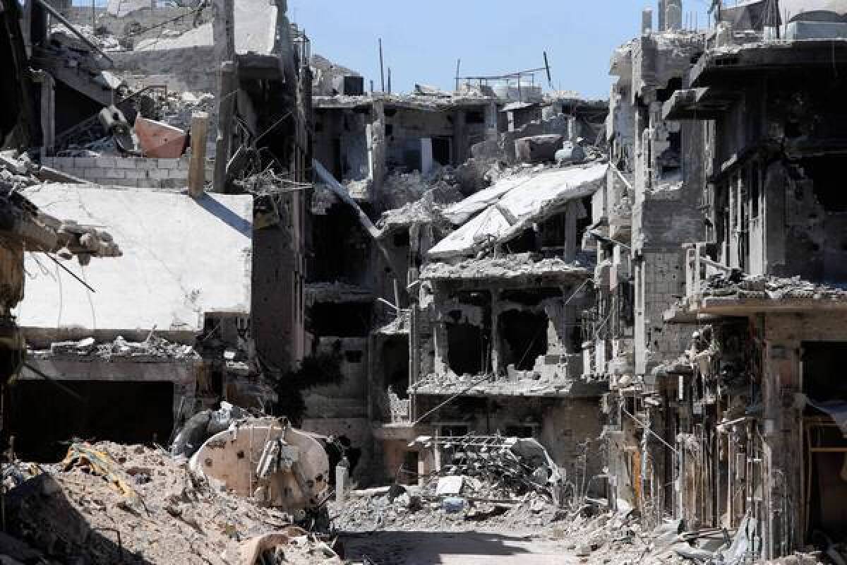 The Khalidiya district of the Syrian city of Homs, pictured in late July, is in ruins.