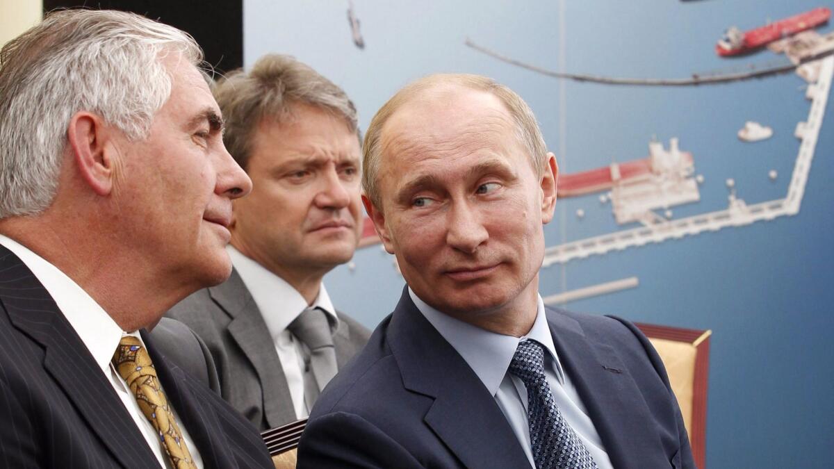 Exxon Mobil Chairman and CEO Rex Tillerson and Russian President Vladimir Putin are shown together in Russia in 2012 at a ceremony commemorating the signing of an agreement to develop hard-to-access oil reserves in western Siberia.
