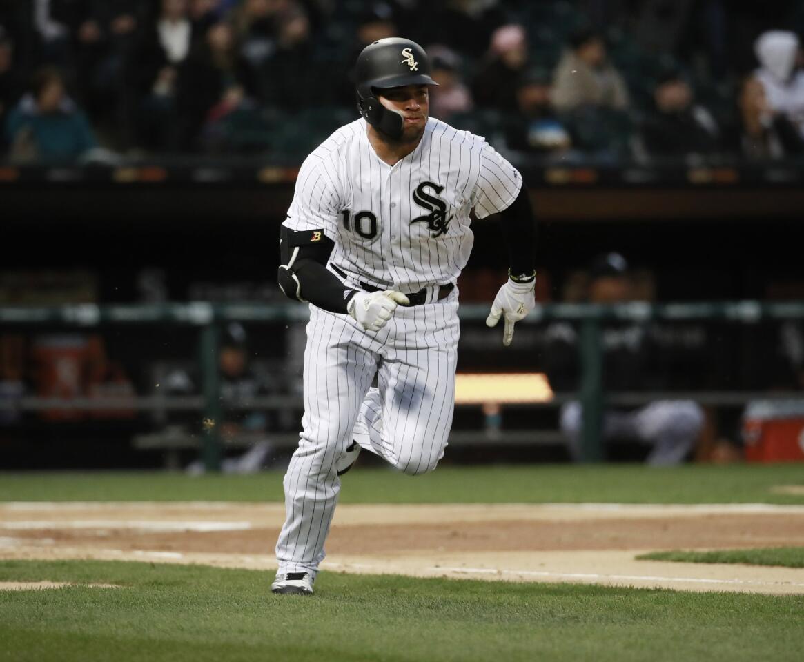 White Sox second baseman Yoan Moncada (10) runs after hitting a triple against the Mariners at Guaranteed rate Field on Monday, April 23, 2018.
