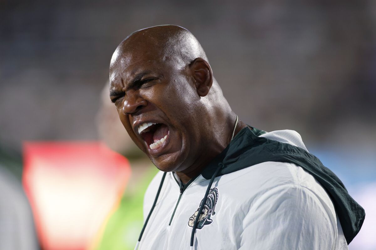 Michigan State coach Mel Tucker yells during the fourth quarter of an NCAA college football game Western Kentucky, Saturday, Oct. 2, 2021, in East Lansing, Mich. Michigan State won 48-31. (AP Photo/Al Goldis)